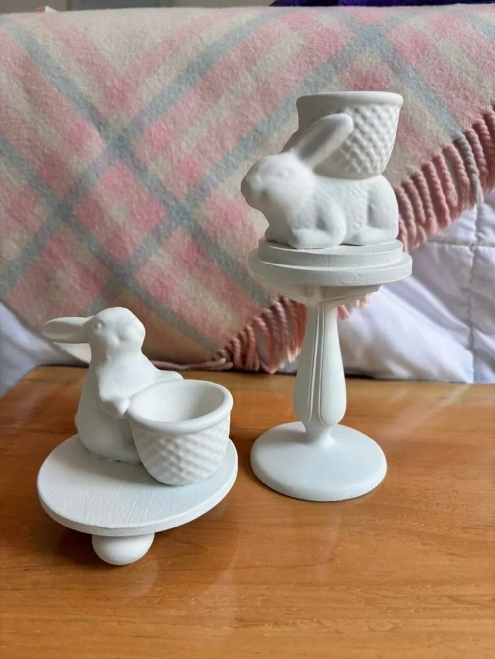 Set of Thrift flip ceramic Easter Bunny egg holders on pedestals